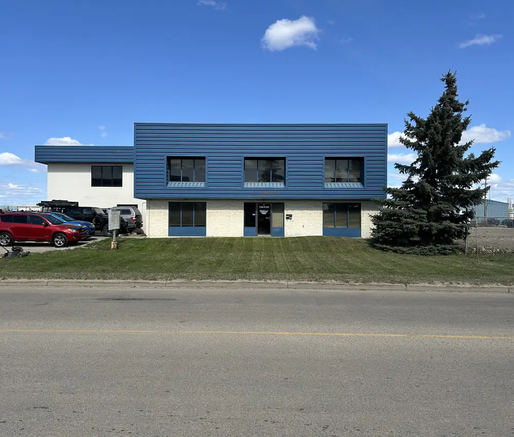 Commercial building in Grande Prairie with a maintained front lawn